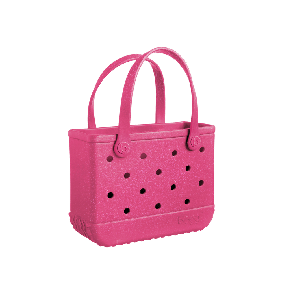 Add a pop of color with the Bogg Bag Watermelon Shimmer! This stylish, durable, & waterproof tote is perfect for beach days, poolside fun, & everyday adventures