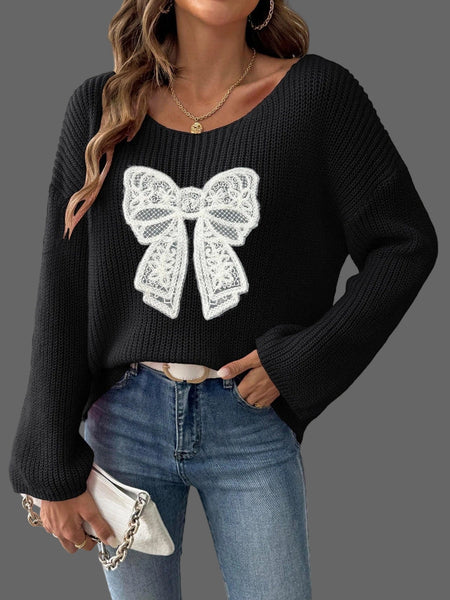 Add a charming twist to your cold-weather wardrobe with our Embroidered Bow One-Shoulder Sweater — where cozy comfort meets feminine flair. 🎀✨