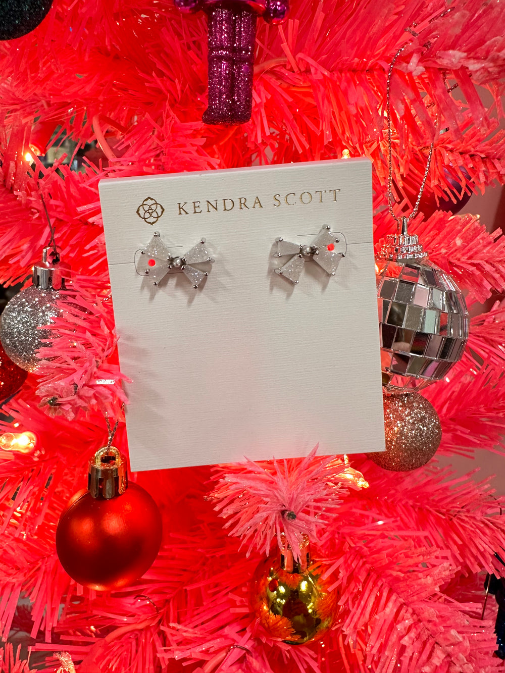 Sophisticated and oh-so-sweet, you’ll be styling the Blair Silver Bow Small Stud Earrings in Iridescent Drusy all season long. A daintier iteration of our Blair Bow Stud Earrings, this sweet style elevates the bow shape with a contemporary, linear design and dazzling drusy stones.