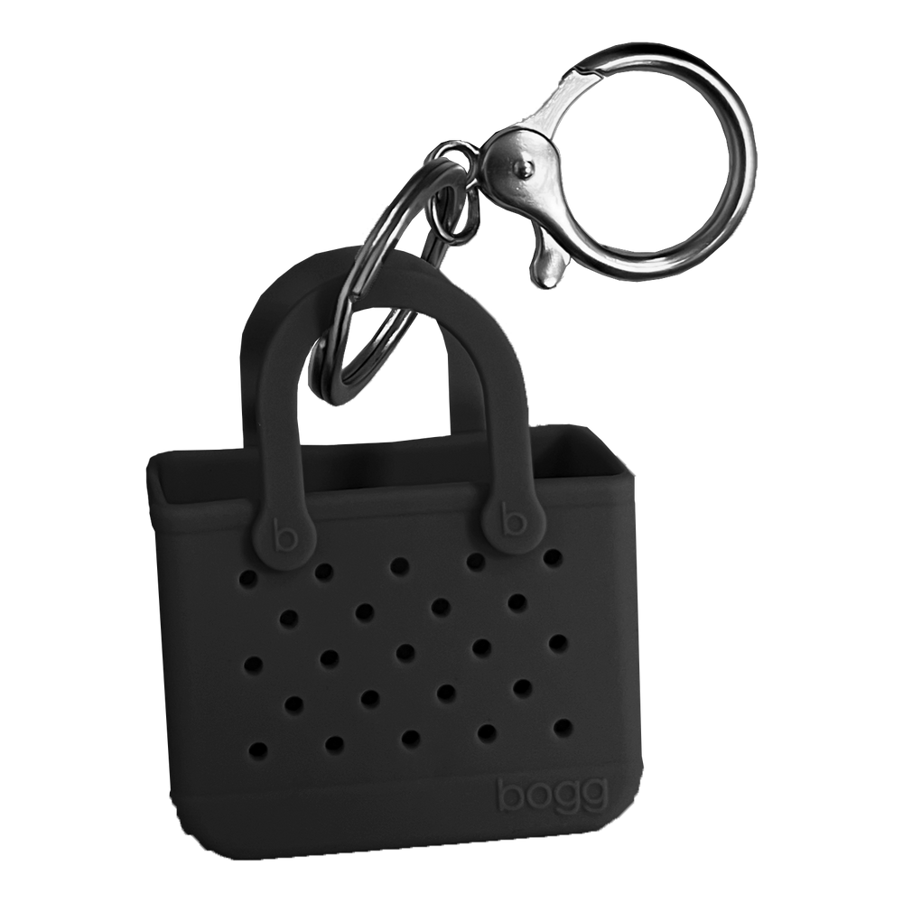 Bogg, but make it mini. We shrunk our iconic tote—down to the buttons and tread bottom and created the cutest keychain ever. The charming accessory can be clipped to zipper pulls, keyrings and more. Perfect for adding an extra dose of fun to your everyday. Collect them all!