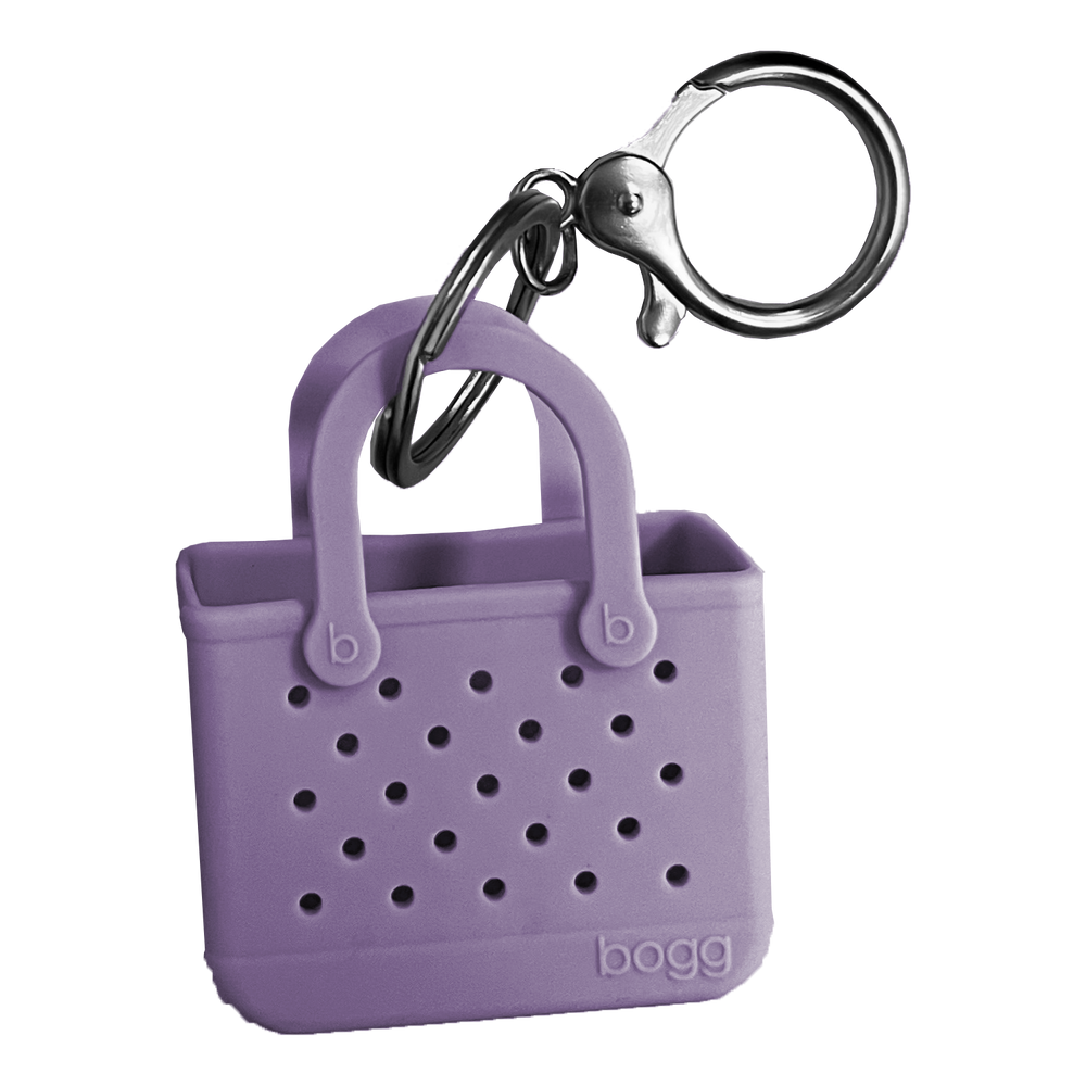 Bogg, but make it mini. We shrunk our iconic tote—down to the buttons and tread bottom and created the cutest keychain ever. The charming accessory can be clipped to zipper pulls, keyrings and more. Perfect for adding an extra dose of fun to your everyday. Collect them all!