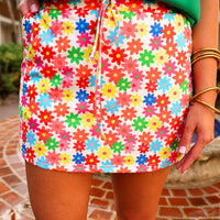 Start a style conversation with this playful colorful floral skort. Made with lightweight fabric, it features an elastic band on the back and built-in shorts to keep you comfortable yet totally on-trend. Side pockets and a drawstring add a practical finishing touch to the fun vibe. Get ready to check out with this skort!