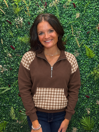Style | Quarter-zip pullover
Pattern | Brown gingham
Neckline | Quarter-zip collar
Fabric | 65% polyester, 35% cotton
Pocket | Front kangaroo pocket
