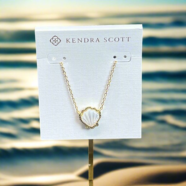 Channel beachy vibes with the Brynne Gold Shell Pendant Necklace in Ivory MOP. Textured details and a chic shell design make it perfect solo or stacked.