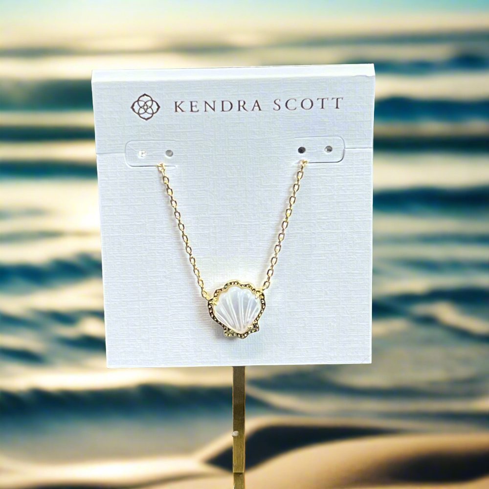Channel beachy vibes with the Brynne Gold Shell Pendant Necklace in Ivory MOP. Textured details and a chic shell design make it perfect solo or stacked.