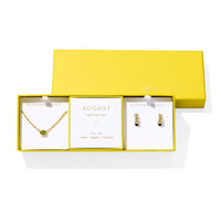 Complete with birthstone-inspired colorways and sparkling details, the Cailin Birthstone Gift Set is perfectly personalized for any occasion. This shining duo pairs a timeless pendant necklace with elevated everyday huggie earrings, creating a gift-ready set that’s pre-wrapped and offered at an exclusive price—ideal for any thoughtful gift giver.