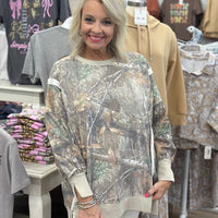 "Classic Camo Crew Neck Pullover with relaxed fit and side slits"