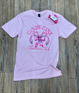Pink t-shirt with candy cane and bow design.