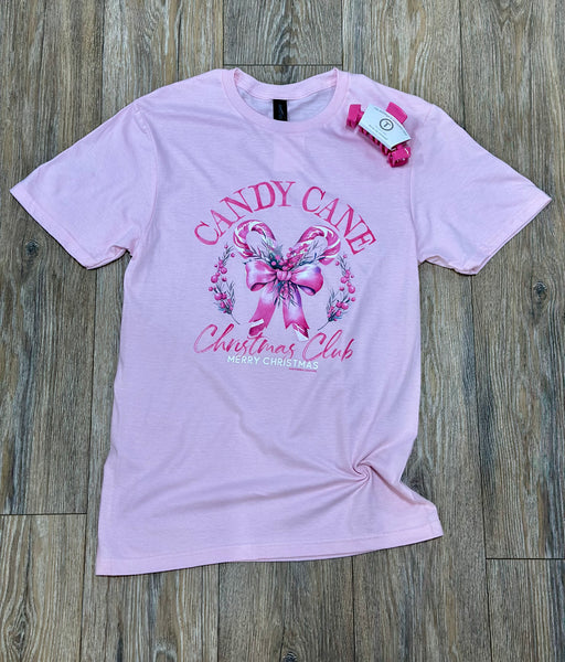 Pink t-shirt with candy cane and bow design.