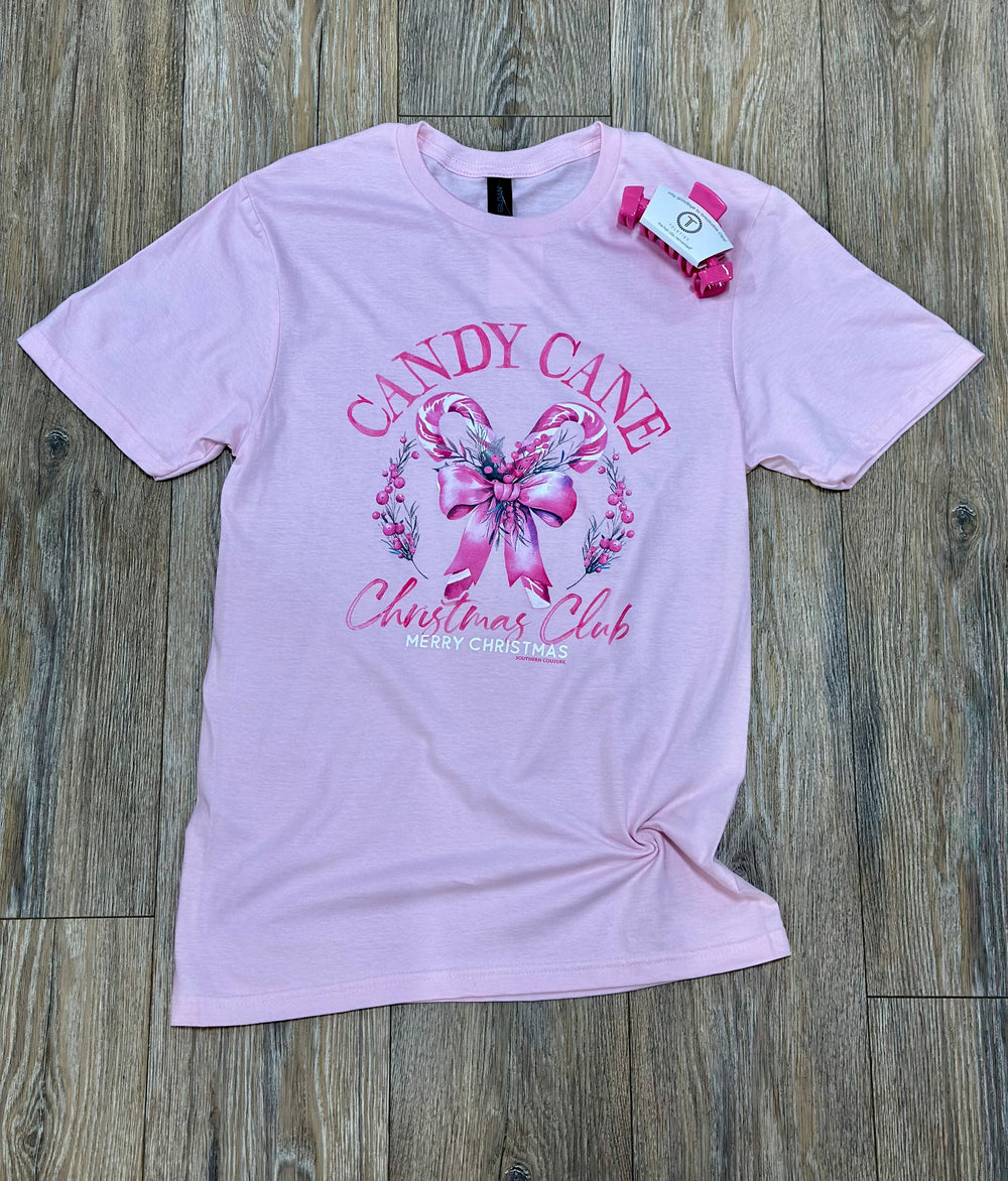 Pink t-shirt with candy cane and bow design.