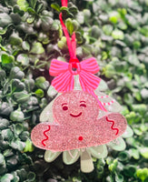 Festive acrylic Christmas claw clips in tree, gingerbread man, present, and snowman designs. Perfect for holiday hairstyles!
