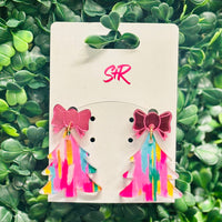 Add a playful pop to your holiday style with these Multicolored Acrylic Tree Dangle Earrings! Bursting with bright color and topped with a shiny pink mirrored bow, they’re the perfect choice for a funky and fun Christmas look. Lightweight, hypoallergenic, and nickel-free—so you can celebrate in comfort and style.