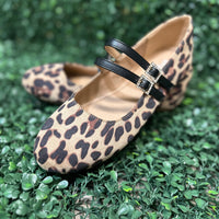 Featuring two sleek buckled straps across the foot, these stylish flats offer a secure fit and a touch of edge. The soft faux leather upper and lightly cushioned insole keep your feet comfy all day