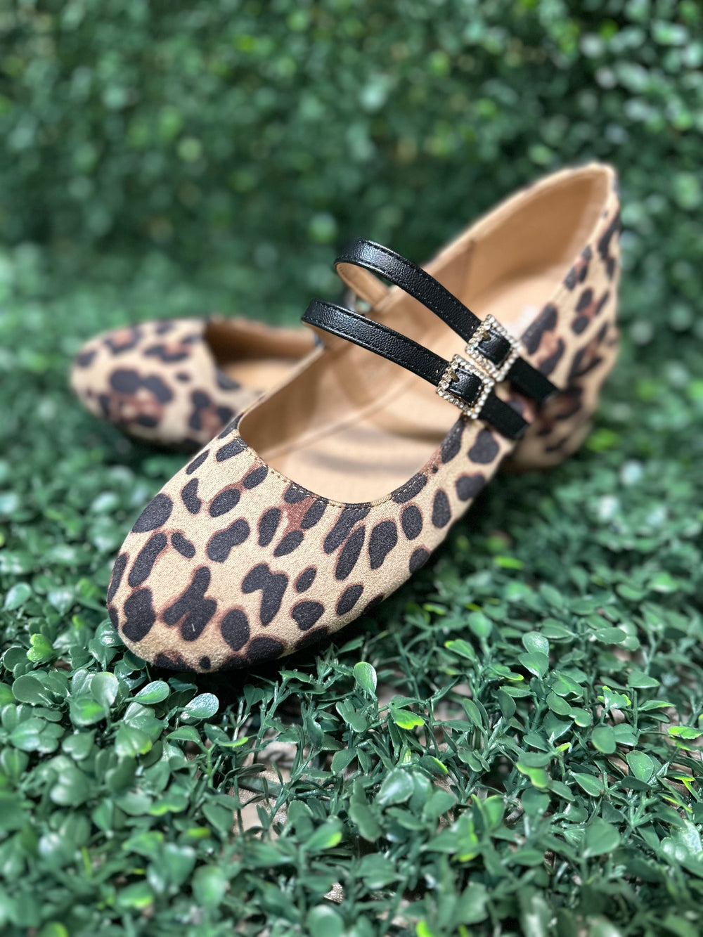 Featuring two sleek buckled straps across the foot, these stylish flats offer a secure fit and a touch of edge. The soft faux leather upper and lightly cushioned insole keep your feet comfy all day