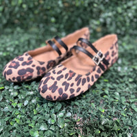 Featuring two sleek buckled straps across the foot, these stylish flats offer a secure fit and a touch of edge. The soft faux leather upper and lightly cushioned insole keep your feet comfy all day