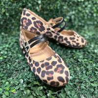 Featuring two sleek buckled straps across the foot, these stylish flats offer a secure fit and a touch of edge. The soft faux leather upper and lightly cushioned insole keep your feet comfy all day