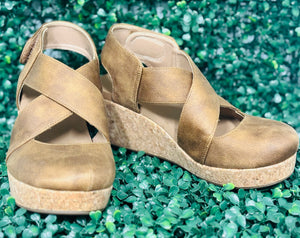 Step Up Your Style with Corky's Case Closed Wedges

Elevate your everyday look with the Corky's Case Closed Shoes. These chic wedges feature a convenient Velcro strap for an adjustable fit and all-day comfort. Crafted in a sophisticated camel faux suede, the crossover strap detail adds a stylish, modern twist that stands out.

✨ Perfect for any occasion—casual to dressy!
👣 Heel Height: 2.5"
👣 Platform Height: 0.75"