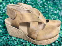 Step Up Your Style with Corky's Case Closed Wedges

Elevate your everyday look with the Corky's Case Closed Shoes. These chic wedges feature a convenient Velcro strap for an adjustable fit and all-day comfort. Crafted in a sophisticated camel faux suede, the crossover strap detail adds a stylish, modern twist that stands out.

✨ Perfect for any occasion—casual to dressy!
👣 Heel Height: 2.5"
👣 Platform Height: 0.75"
