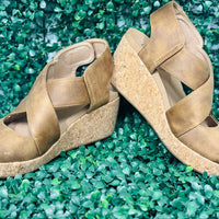 Step Up Your Style with Corky's Case Closed Wedges

Elevate your everyday look with the Corky's Case Closed Shoes. These chic wedges feature a convenient Velcro strap for an adjustable fit and all-day comfort. Crafted in a sophisticated camel faux suede, the crossover strap detail adds a stylish, modern twist that stands out.

✨ Perfect for any occasion—casual to dressy!
👣 Heel Height: 2.5"
👣 Platform Height: 0.75"