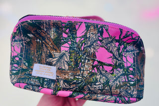 Camouflage-patterned pouch with pink accents 