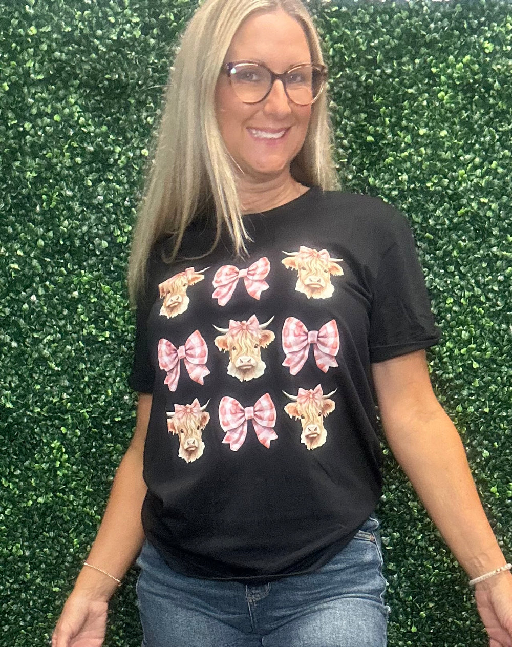 Elevate your everyday style with the Cow Coquette Bow Tee—a playful mix of chic and cozy. Featuring a charming cow print accented with a sweet coquette-inspired bow, this tee blends comfort with personality, letting you showcase your unique charm on any occasion. ✨