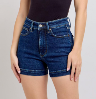 Flattering, comfortable, and made for your best warm-weather days. The Judy Blue Dark Wash High Waisted Tummy Control Shorts combine a sleek dark wash denim finish with a high, straight cut and built-in tummy control for a polished, confidence-boosting silhouette that works effortlessly from casual outings to weekend adventures. Crafted from a 94% Cotton / 5% Polyester / 1% Spandex blend, they offer just enough stretch for all-day comfort without sacrificing structure or shape.