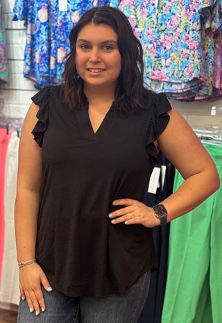 Feminine details, effortless wear. The Lizzy Flutter Top brings together a mandarin collar, pleated back detail, and soft flutter sleeves in a relaxed stretchy knit that moves with you — a wardrobe staple that works as hard as you do.