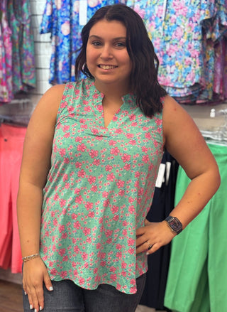 Fresh, flirty, and made for warm days. This colorful sleeveless top features an A-line bodice with a split neckline and mandarin collar — a combination that's effortlessly chic and cool enough to carry you through the season in style.