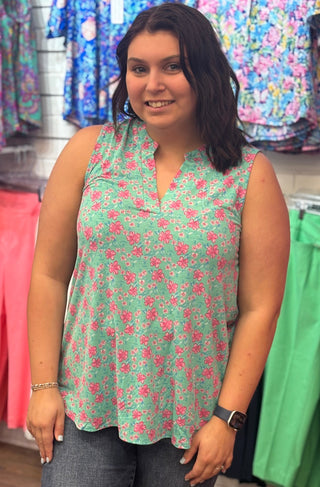 Fresh, flirty, and made for warm days. This colorful sleeveless top features an A-line bodice with a split neckline and mandarin collar — a combination that's effortlessly chic and cool enough to carry you through the season in style.