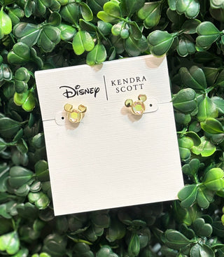 A little magic in every detail. These Disney | Kendra Scott Mickey Mouse Stud Earrings feature the iconic Mickey Mouse silhouette crafted in luminous dichroic glass and set in 14K gold over brass — a sparkling, everyday piece that brings a touch of Disney magic to any look.