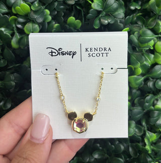 A little magic, a lot of sparkle. This signature Kendra Scott pendant — crowned with iconic Mickey Mouse ears — is crafted in luminous dichroic glass and suspended from a crystal-studded satellite chain in 14K gold over brass. It's the kind of piece that feels special every time you put it on.

Key Details
Stone | Dichroic Glass
Metal | 14K Gold Over Brass
Chain Length | 14" with 5" extender
Pendant Size | 0.76"L x 0.53"W
Closure | Lobster clasp with single adjustable slider bead