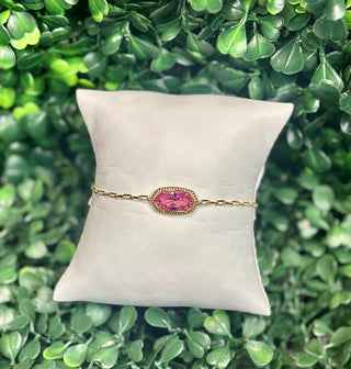 Elaina Luxe Chain Bracelet gold light pink with cubic zirconia oval stone on silver paperclip chain.