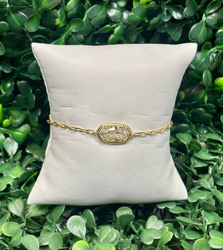 Elaina Luxe Chain Bracelet Silver gold with cubic zirconia oval stone on gold paperclip chain.