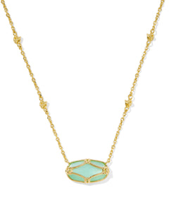 Featuring intricate lattice-inspired metalwork and a luminous ivory mother-of-pearl center, this necklace brings artistic elegance to any look. Whether worn solo or layered in a stack, it’s a timeless piece you'll reach for again and again.