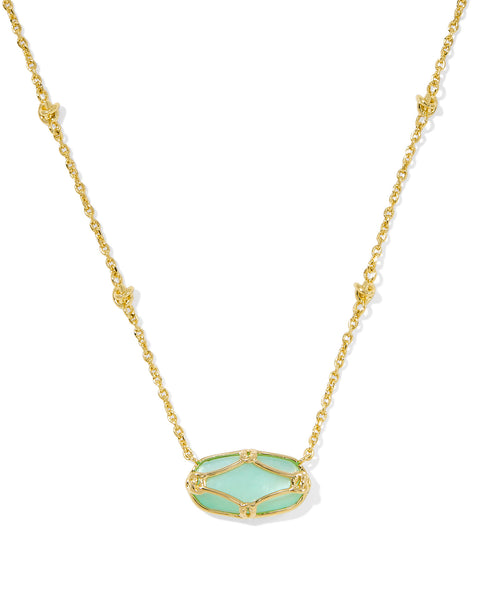 Featuring intricate lattice-inspired metalwork and a luminous ivory mother-of-pearl center, this necklace brings artistic elegance to any look. Whether worn solo or layered in a stack, it’s a timeless piece you'll reach for again and again.