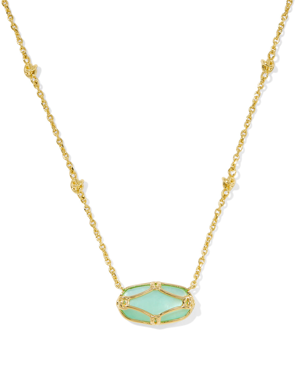 Featuring intricate lattice-inspired metalwork and a luminous ivory mother-of-pearl center, this necklace brings artistic elegance to any look. Whether worn solo or layered in a stack, it’s a timeless piece you'll reach for again and again.