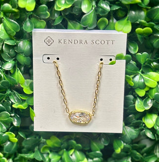 Elisa Luxe Short Pendant Necklace Gold White with oval cubic zirconia on gold paperclip chain.