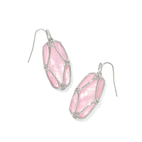 Elle Lattice Frame Earrings in Blush Ivory Mother of Pearl

Our iconic, eye-catching Elle earrings just got an artistic upgrade. The Elle Lattice Frame Silver Drop Earrings in Blush Ivory Mother of Pearl&nbsp;feature a brand-new metalwork design inspired by the delicate texture of lace. Framed in refined gold, the ivory mother-of-pearl stones shimmer with elegance, making these a standout addition to any collection. Bold yet timeless, they bring the perfect balance of color, craftsmanship, and sta