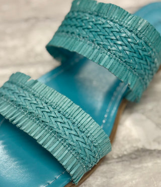 Empress Sandal - Turquoise
Step into spring and summer with ease in our Empress Sandals in Turquoise! These slide-on beauties feature a gorgeous double woven strap, adding the perfect touch of texture and fun to any outfit. 
Effortlessly stylish and oh-so-comfy, they’re a must-have for the sunny season!
Pierre Dumas Shoe 
Square toe shoe 
Flat sole 
woven strap detail
