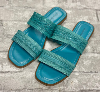 Empress Sandal - Turquoise
Step into spring and summer with ease in our Empress Sandals in Turquoise! These slide-on beauties feature a gorgeous double woven strap, adding the perfect touch of texture and fun to any outfit. 
Effortlessly stylish and oh-so-comfy, they’re a must-have for the sunny season!
Pierre Dumas Shoe 
Square toe shoe 
Flat sole 
woven strap detail