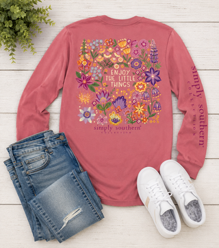 Brand | Simply Southern
Style | Long Sleeve Graphic Tee
Graphic | Colorful wildflower botanical with "Enjoy The Little Things" saying
Sleeve Detail | Simply Southern Collection branding along the sleeve
Color | Tea Rose
Fit | Relaxed, true-to-size
Sizes Available | S, M, L, XL, XXL
Care | Machine wash cold, tumble dry low