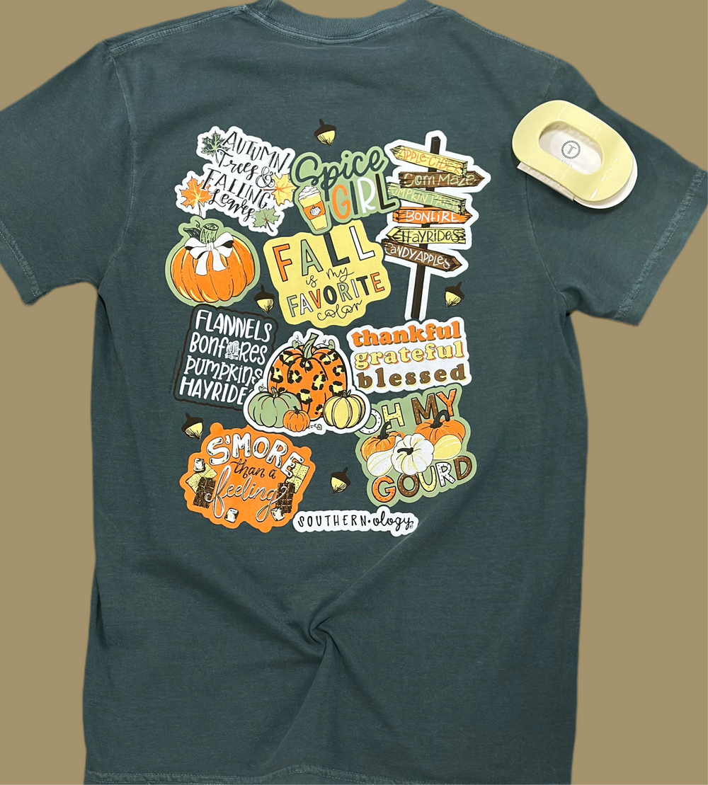 All your favorite fall things—on one tee! The Fall Decals design by Southernology® is a cozy collage of everything we love about autumn: pumpkins, lattes, crunchy leaves, and flannel feels. It’s like wearing a seasonal sticker book — fun, festive, and full of charm. Whether you're heading to a harvest festival or strolling through the pumpkin patch, this tee is a fall essential.