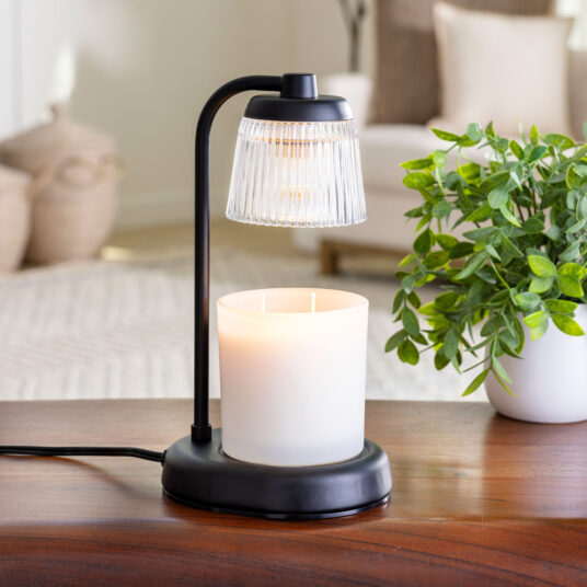 Enjoy the cozy glow and beautiful scent of your favorite candle—without the flame! Our Fluted Glass Candle Warmer Lamp uses top-down warming technology to gently melt the candle from above, releasing fragrance quickly, cleanly, and safely. The elegant fluted glass shade adds a sophisticated touch to any space, while the clear design allows light and warmth to shine through beautifully.
Perfect for creating ambiance without the worry of open flames, soot, or toxins—just pure, instant fragrance.