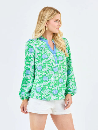 The Gianna Top adds personality to an everyday essential. Designed with a button-front placket, long sleeves with elastic cuffs, and a ruffle neckline, it’s easy to wear and full of charm. Pair it with your favorite denim for laid-back days or style it with tailored pieces for a dressed-up look that still feels effortless.