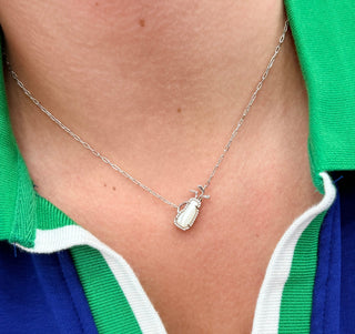 Kendra Scott Necklace 
Kendra Scott Golf Necklace 
Silver (rhodium plated) Chain 
Ivory mother of pearl stone