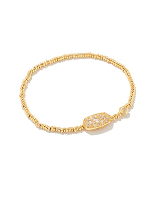 Stone | White Crystal
Finish | Gold tone
Design | Metal beads with a crystal station
Fit | Stretch bracelet