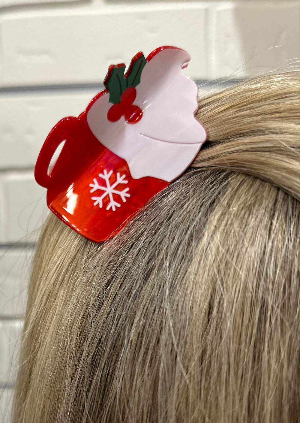 Add a cozy, playful touch to your hairstyle with the Hot Chocolate Claw Clip. This 3x2 acrylic claw clip is perfect for keeping hair stylishly in place while adding a fun seasonal vibe. Lightweight, durable, and easy to wear, it’s a must-have accessory for the holiday season.