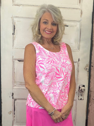 Sleek, simple, and effortlessly stylish! This sleeveless tank is made from a soft, stretchy 92% Nylon / 8% Spandex blend and features a classic tank neckline with a straight hemline. With a center back length of 24 inches and pre-shrunk fabric, it offers a flattering fit that lasts. Easy to care for—just machine wash and wear again and again!
