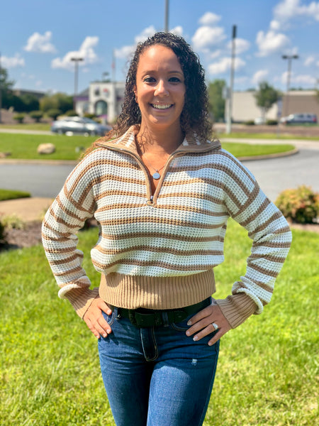 The Simply Southern Iris Sweater effortlessly blends classic charm with modern style!  Featuring a cozy quarter-zip, oversized collar, cropped fit, and signature logo label. Made of 60% cotton & 40% polyester for comfort and durability.