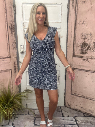 Jane Dress Leaf Me Alone

Cap sleeve V-neck dress

Lightweight summer dress

Nylon spandex breathable dress

UPF50+ sun protection dress

Quick-dry wrinkle-free dress

Casual summer outfit

Vacation or beach dress

Breezy everyday dress

Leaf print cap sleeve dress